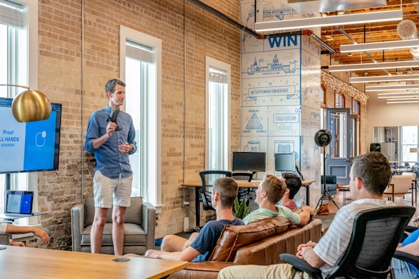 Business professionals shaking hands after successful compliance deal